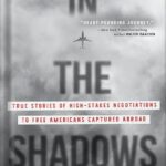 خرید و دانلود نسخه کامل کتاب In the Shadows: True Stories of High-Stakes Negotiations to Free Americans Captured Abroad by Mickey Bergman