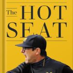 خرید و دانلود نسخه کامل کتاب The Hot Seat: A Year of Outrage, Pride, and Occasional Games of College Football by Ben Mathis-Lilley