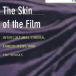 خرید و دانلود نسخه کامل کتاب The Skin of the Film: Intercultural Cinema, Embodiment, and the Senses