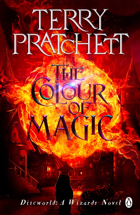 the-colour-of-magic-by-terry-pratchett_6a07765425bb5 خرید و دانلود نسخه کامل کتاب صوتی انگلیسی رنگ جادو، اثر تری پرچت (از مجموعهی دیسکورلد, رینسویند) The Colour of Magic by Terry Pratchett - تصویر 1